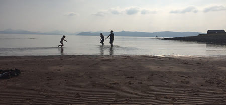 playing on beach applecross